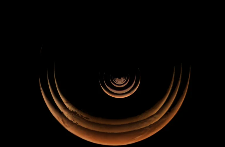 nasas-psyche-mission-captures-stunning-time-lapse-of-mars-crescent-as-spacecraft-approaches-for-gravity-assist