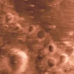 nasas-psyche-spacecraft-successfully-navigates-mars-flyby-gaining-crucial-gravitational-boost-and-scientific-insights-en-route-to-metal-asteroid