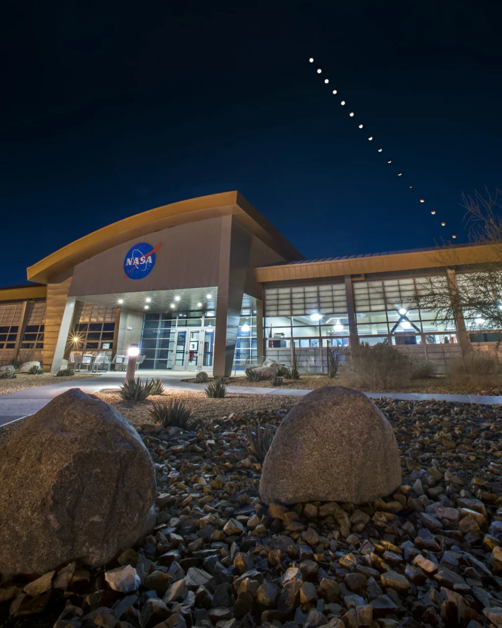 Image is NASA Armstrong Flight Research Center’s mission support building with a composite of 16 images of the eclipsed moons overhead during Jan. 31 Super Blue Blood Moon.