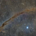 the-dark-doodad-nebula-drifts-through-southern-skies-a-glimpse-into-stellar-nurseries