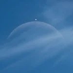 a-crescent-moon-and-venus-embrace-the-daylight-sky-over-france