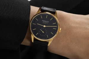 nomos-glashutte-unveils-orion-gold-neomatik-new-black-edition-a-masterclass-in-refined-luxury-and-timeless-design