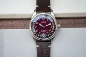 oris-big-crown-pointer-date-x-cervo-volante-burgundy-dial-edition-embodies-heritage-and-sustainability